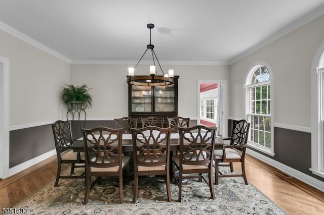 146 Linden Dr, Bernards Twp, NJ 07920 - dining area featuring a chandelier, wood finished floors, and crown molding