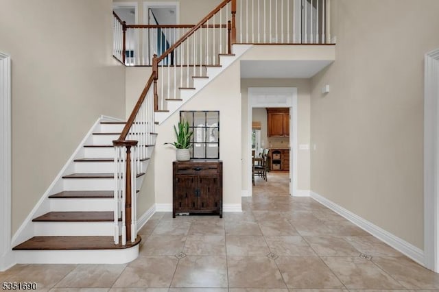 146 Linden Dr, Bernards Twp, NJ 07920 - foyer entrance with a high ceiling, stairway, and tile patterned floors