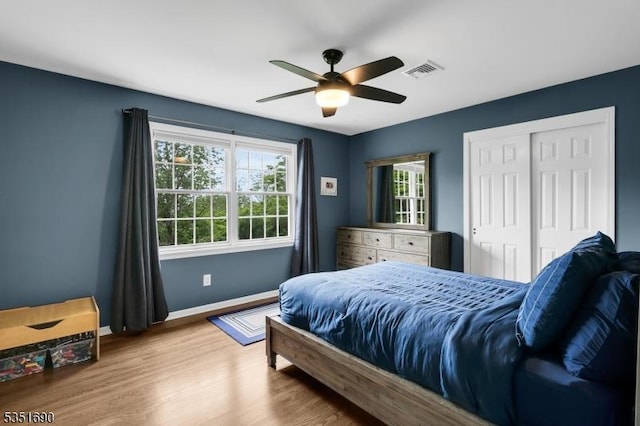 146 Linden Dr, Bernards Twp, NJ 07920 - bedroom with wood finished floors, a ceiling fan, and a closet