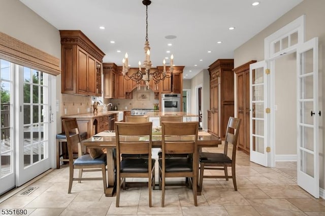 146 Linden Dr, Bernards Twp, NJ 07920 - dining area featuring french doors, a chandelier, and recessed lighting