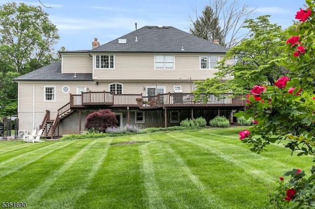 146 Linden Dr, Bernards Twp, NJ 07920 - rear view of property with a deck, stairway, a lawn, a chimney, and roof with shingles