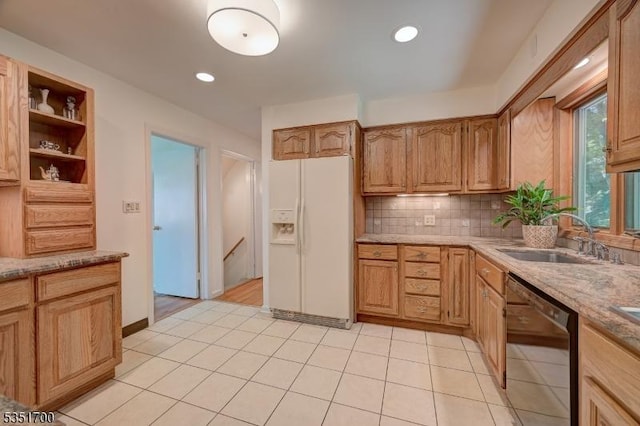 27 Belgrade Ter, West Orange Twp, NJ 07052 - kitchen featuring white refrigerator with ice dispenser, a sink, black dishwasher, backsplash, and open shelves