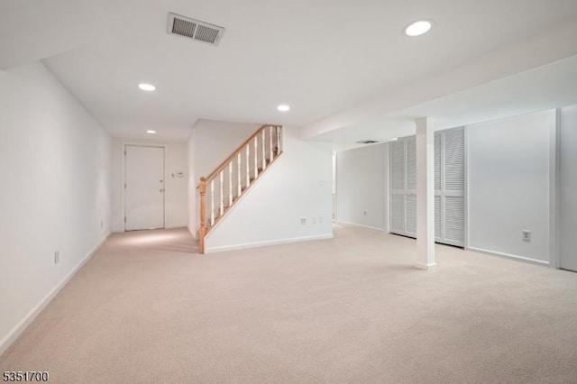 27 Belgrade Ter, West Orange Twp, NJ 07052 - finished below grade area with light colored carpet, stairs, recessed lighting, and baseboards