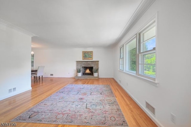 27 Belgrade Ter, West Orange Twp, NJ 07052 - living room with ornamental molding, wood finished floors, a fireplace, and baseboards