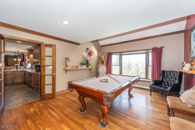 playroom featuring a baseboard radiator, pool table, ornamental molding, baseboards, and dark wood-type flooring