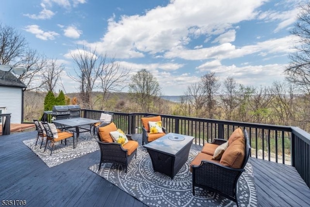 deck with outdoor lounge area, outdoor dining area, and a grill