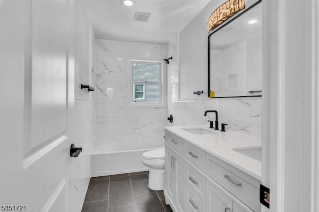 full bathroom with a sink, double vanity, toilet, bathtub / shower combination, and visible vents