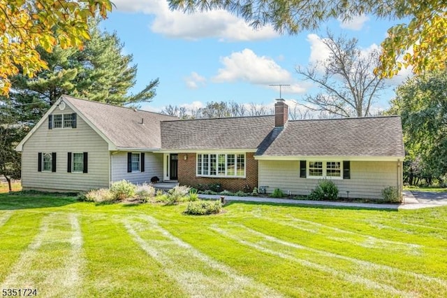 161 Orchard Rd, Montgomery Twp, NJ 08558 - view of front of home featuring a front lawn, a shingled roof, and a chimney