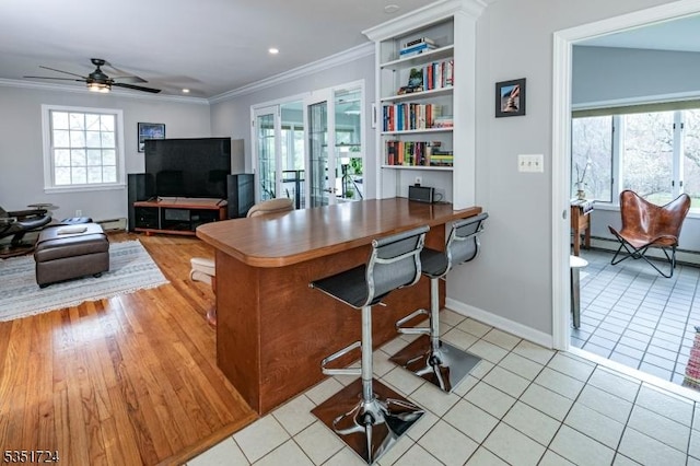 161 Orchard Rd, Montgomery Twp, NJ 08558 - kitchen featuring ornamental molding, ceiling fan, a peninsula, and a healthy amount of sunlight
