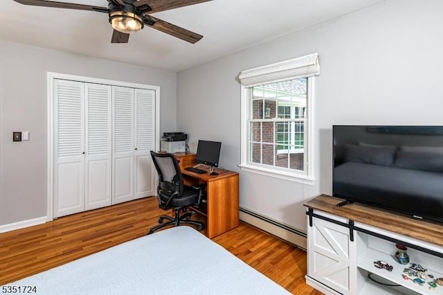 161 Orchard Rd, Montgomery Twp, NJ 08558 - office area featuring baseboard heating, light wood-type flooring, and a ceiling fan
