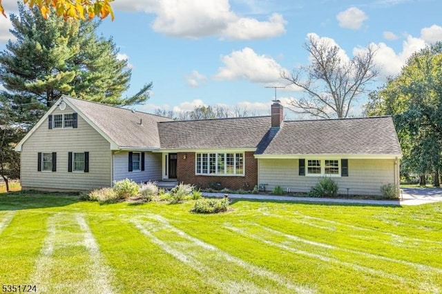 161 Orchard Rd, Montgomery Twp, NJ 08558 - back of property with a chimney, roof with shingles, and a lawn