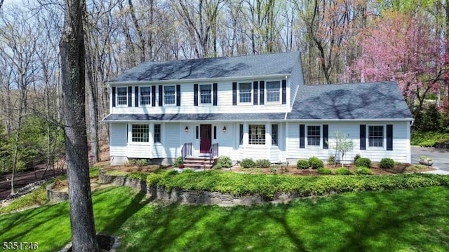 view of front of property with a front lawn