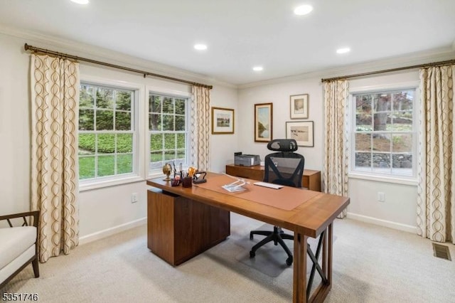home office with baseboards, light carpet, and visible vents