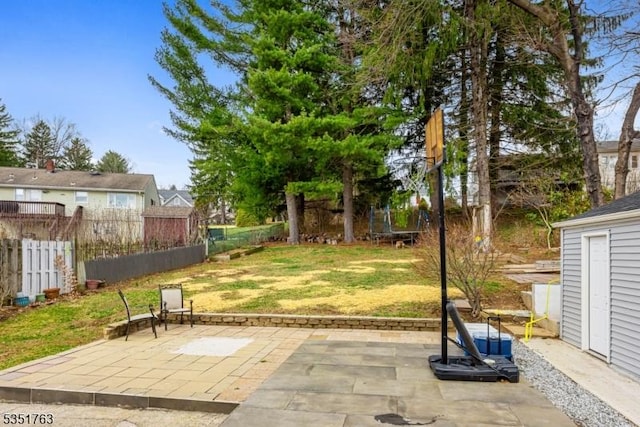 view of patio / terrace featuring fence