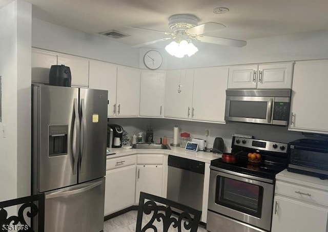 539 Bayway Ave Unit 2B, Elizabeth City, NJ 07202 - kitchen featuring a ceiling fan, stainless steel appliances, visible vents, and light countertops