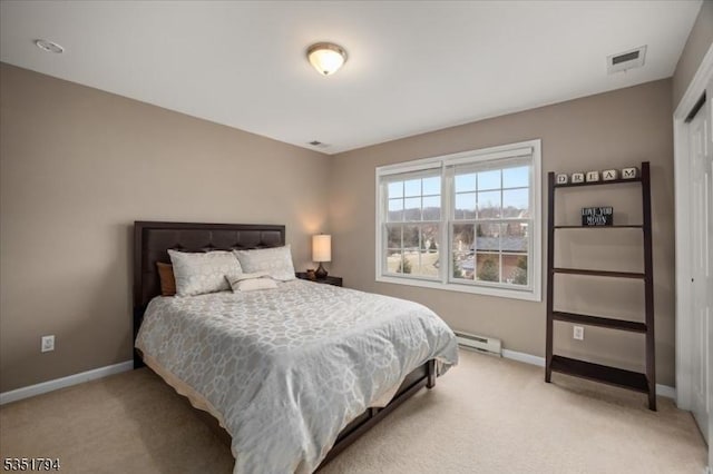 bedroom with visible vents, baseboards, light carpet, and a baseboard radiator