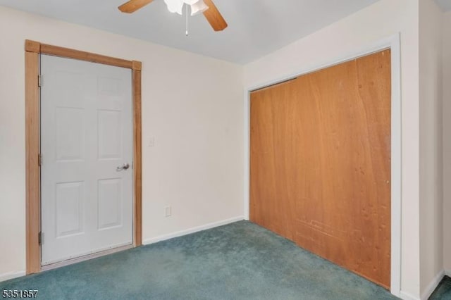 unfurnished bedroom featuring a ceiling fan, baseboards, carpet, and a closet