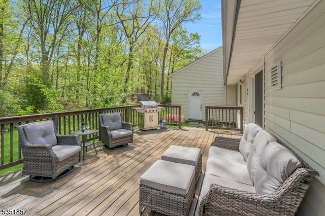 wooden deck featuring outdoor lounge area