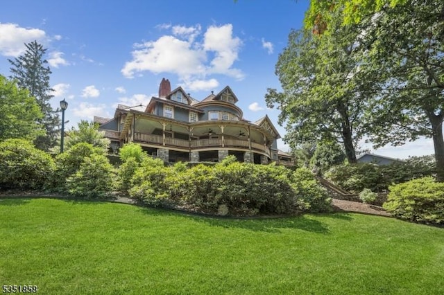 33 Edgemere Ave, Mount Arlington Boro, NJ 07856 - back of house featuring a balcony and a lawn