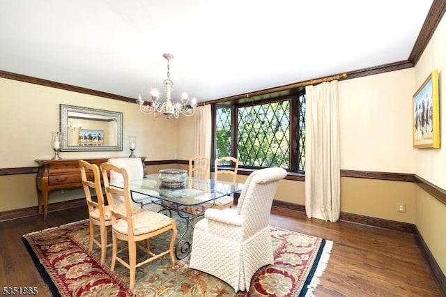 70 Friar Ln, Watchung Boro, NJ 07069 - dining area featuring a chandelier, wood finished floors, crown molding, and baseboards