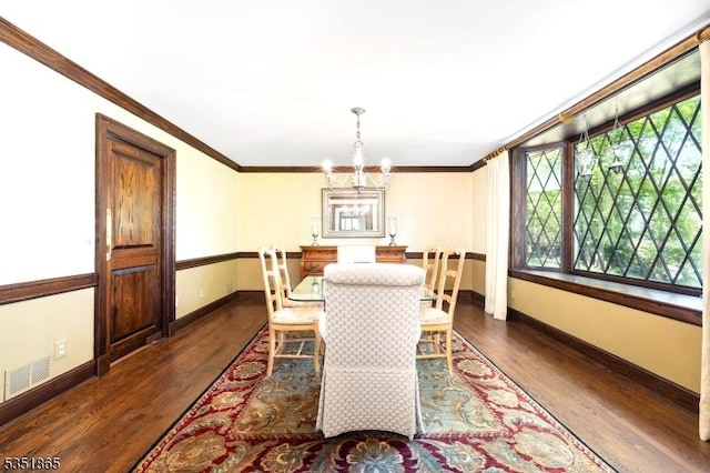 70 Friar Ln, Watchung Boro, NJ 07069 - dining room featuring a chandelier, baseboards, dark wood finished floors, and crown molding