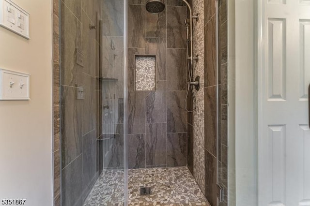 full bathroom featuring a stall shower