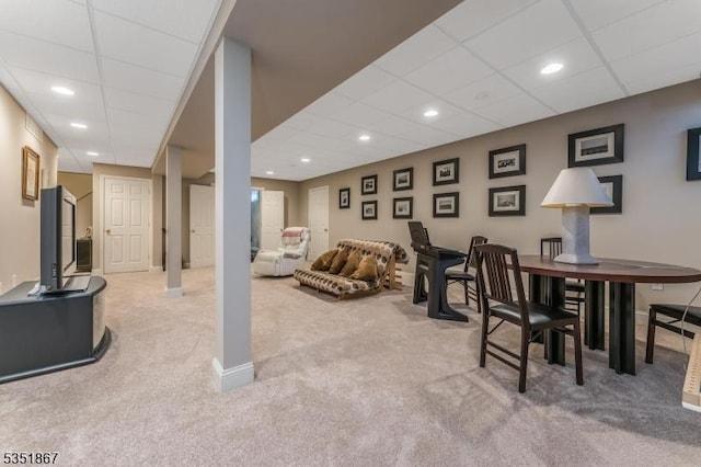interior space with baseboards, carpet, recessed lighting, and a paneled ceiling