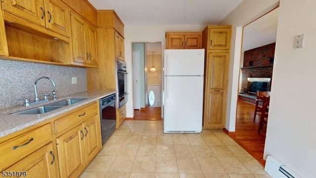 11 Kory Rd, Newton Town, NJ 07860 - kitchen with light tile patterned flooring, a sink, a baseboard radiator, backsplash, and black appliances