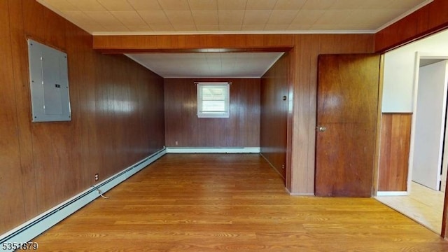 11 Kory Rd, Newton Town, NJ 07860 - interior space with ornamental molding, wood finished floors, wooden walls, baseboard heating, and electric panel