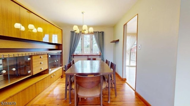 11 Kory Rd, Newton Town, NJ 07860 - dining space featuring light wood finished floors and a chandelier