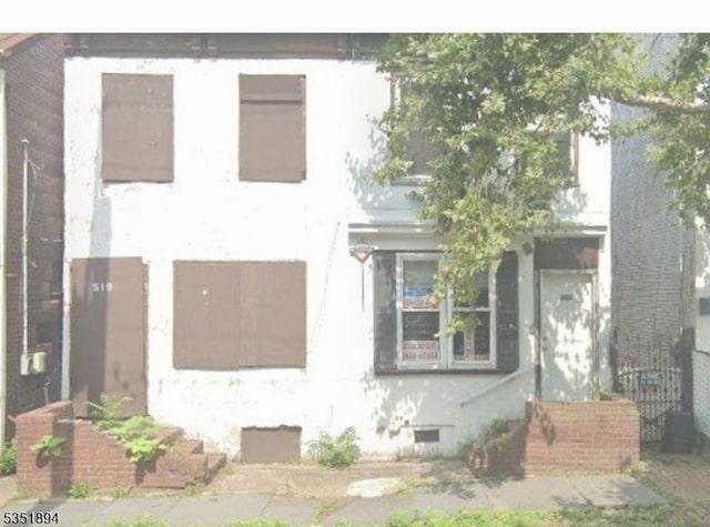 exterior space featuring stucco siding