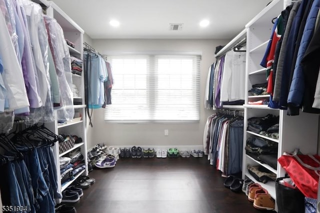 walk in closet with visible vents