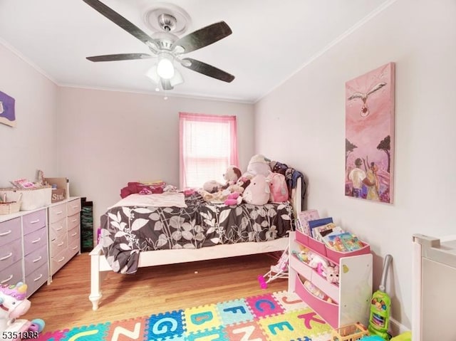 329 Hobson St, Newark City, NJ 07112 - bedroom with crown molding, light wood-style floors, and a ceiling fan