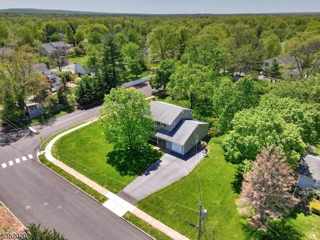 aerial view with a wooded view
