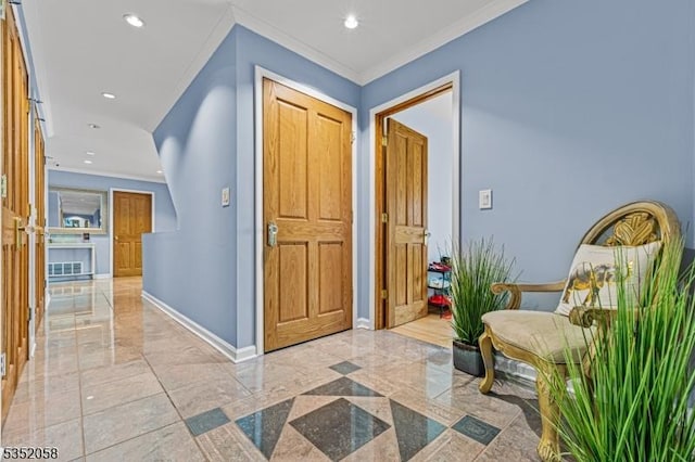 corridor with recessed lighting, crown molding, and marble finish floor