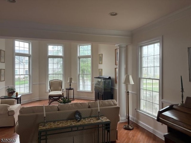 601 Buhler Ct, Pine Beach Boro, NJ 08741 - living area featuring baseboards, crown molding, and light wood-style flooring