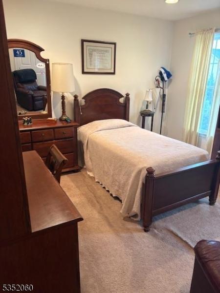 601 Buhler Ct, Pine Beach Boro, NJ 08741 - bedroom with light carpet