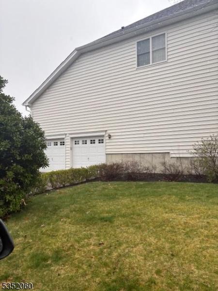 601 Buhler Ct, Pine Beach Boro, NJ 08741 - view of side of property with a yard