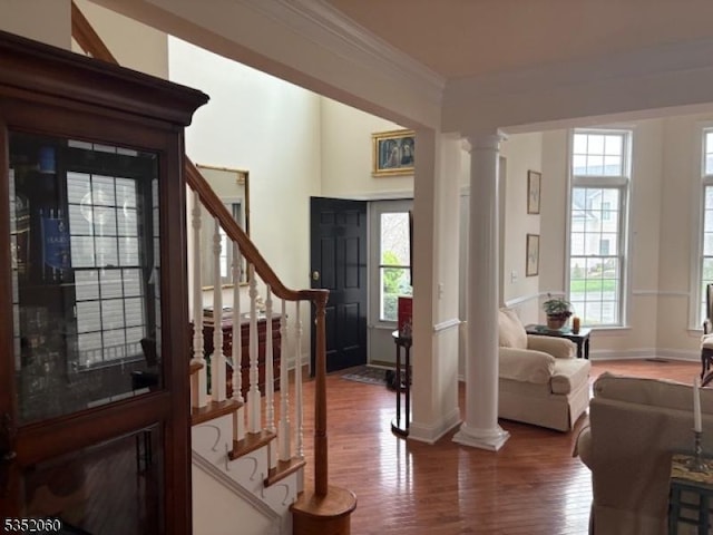 601 Buhler Ct, Pine Beach Boro, NJ 08741 - foyer entrance featuring wood finished floors, decorative columns, baseboards, stairs, and ornamental molding