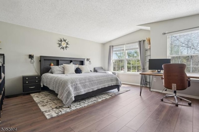 bedroom featuring baseboards, a textured ceiling, dark wood-style flooring, and lofted ceiling