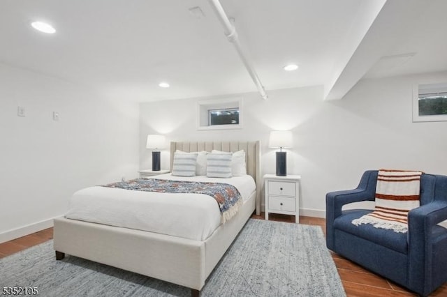 bedroom featuring recessed lighting, baseboards, and wood finished floors