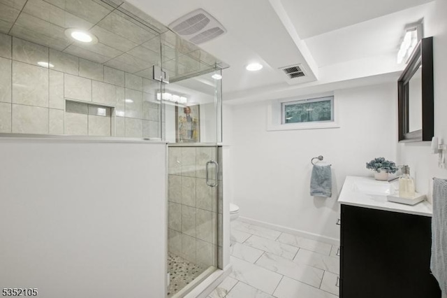 full bath with vanity, marble finish floor, toilet, recessed lighting, and a stall shower