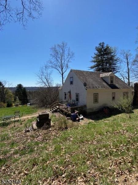 28 Dogwood Ln, Washington Twp, NJ 07882 - view of side of property with a wooden deck
