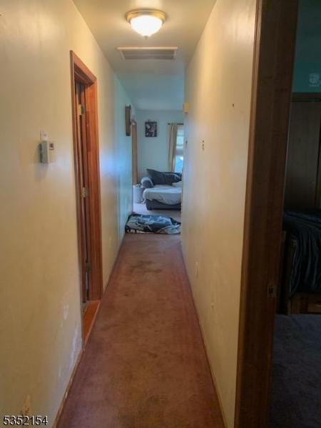 445 E Cape May, Ocean Gate Boro, NJ 08740 - corridor with carpet flooring