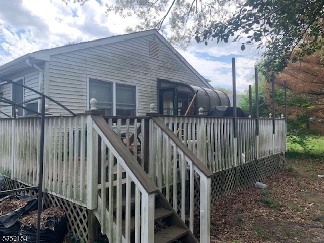 445 E Cape May, Ocean Gate Boro, NJ 08740 - back of property with stairway and a deck
