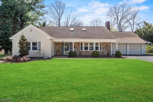 19 Tunnell Rd, Franklin Twp, NJ 08873 - ranch-style house with stone siding, a chimney, a garage, a front yard, and aphalt driveway