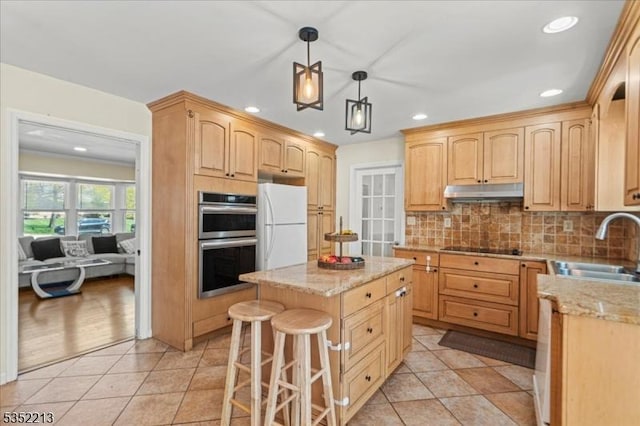 19 Tunnell Rd, Franklin Twp, NJ 08873 - kitchen featuring recessed lighting, light brown cabinetry, stainless steel double oven, a sink, and a center island