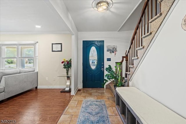 19 Tunnell Rd, Franklin Twp, NJ 08873 - entryway featuring baseboards, crown molding, and stairs