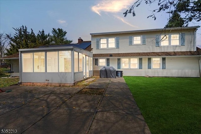19 Tunnell Rd, Franklin Twp, NJ 08873 - rear view of property featuring a sunroom and a lawn
