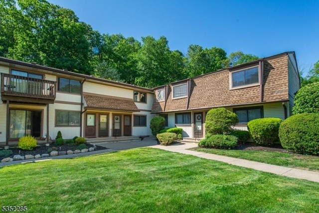 2011B Stonegate Ln Unit B, Stanhope Boro, NJ 07874 - townhome / multi-family property with a front lawn, a shingled roof, and mansard roof